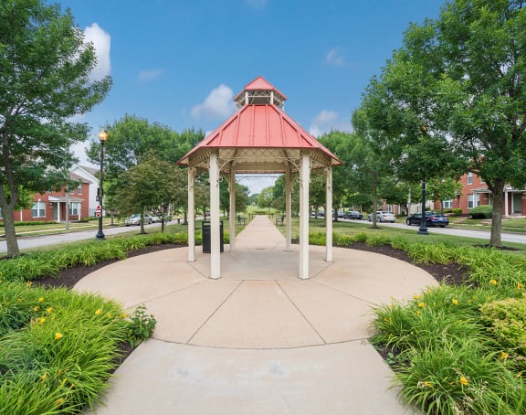 a gazebo in the middle of a park