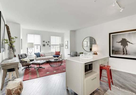 an open living room with a counter and a living room at Reed Row, Washington