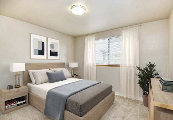 A bedroom with a bed, nightstand, and a plant.