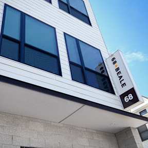 A building with a sign that says 68 BALE.