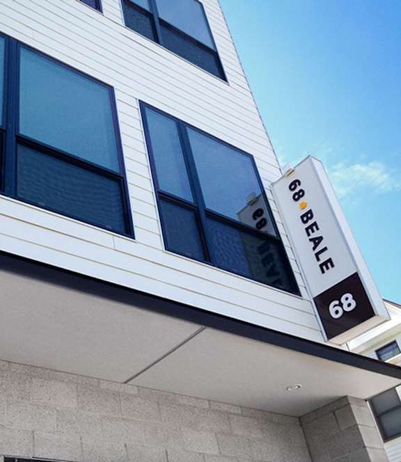 A building with a sign that says 68 BALE.