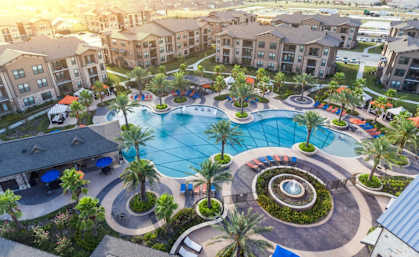 an aerial view of a swimming pool at the resort