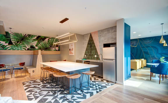 a kitchen and dining room with a blue and white tile floor at Hazel Apartments, Edmonds, 98026
