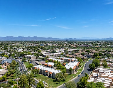 A view of a residential area with houses and roads.
