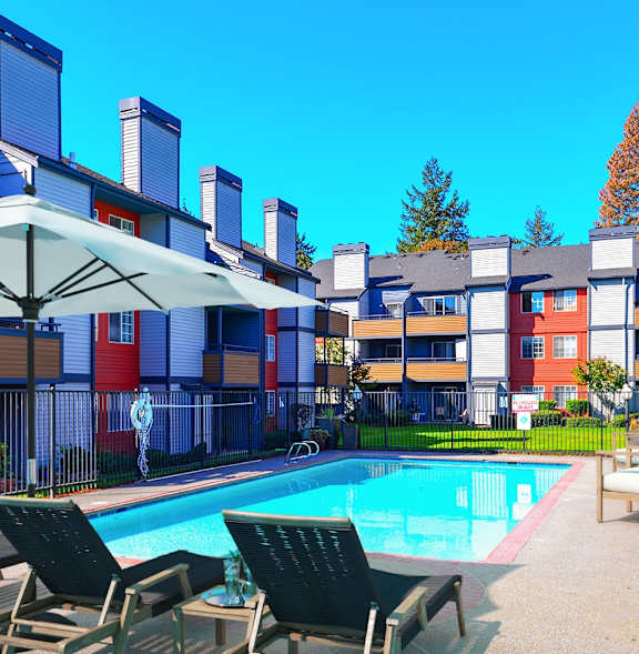 The Lucent Apartments in Tacoma, Washington Pool with Lounge Chairs