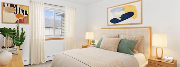 A bedroom with a large bed, a nightstand, and a painting on the wall.