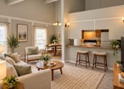 Thumbnail 2 of 11 - A living room with a couch, chairs, and a coffee table at Lifestyle at Shreveport in Shreveport, LA, 71109.