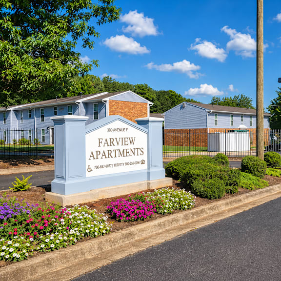The entrance to Farview Apartments is marked by a large sign.