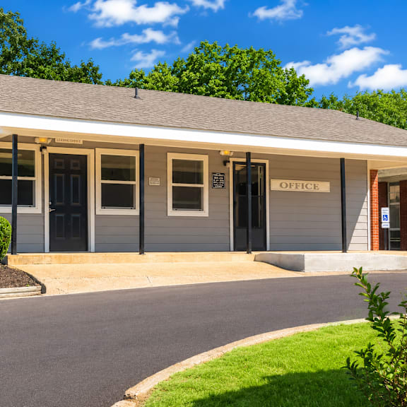A small building with a sign that says "OFFICE" on the front.