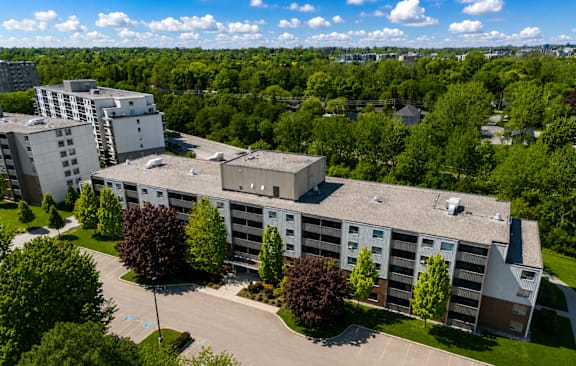 A parking lot in front of a building.