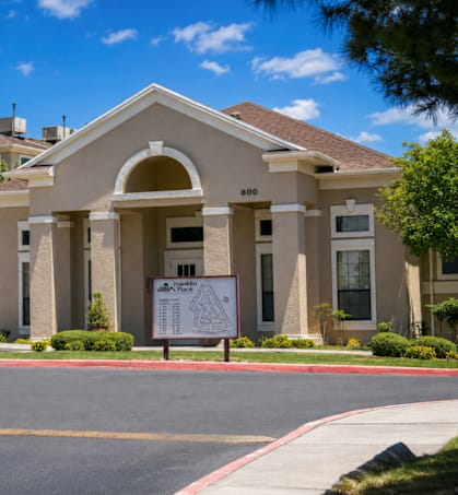 A building with a sign in front of it.