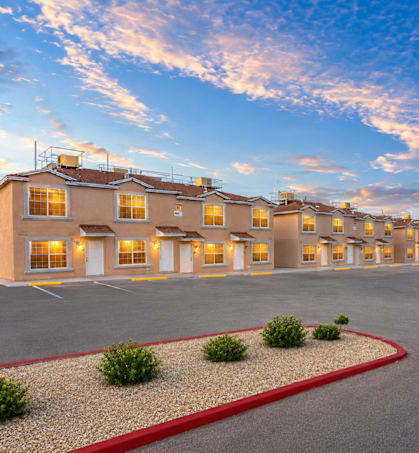 A parking lot in front of a building with a red border.