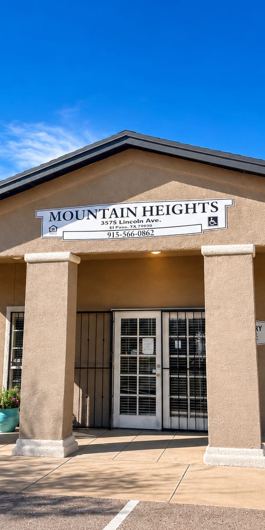 The front of a building with the name "Mountain Heights" on it.