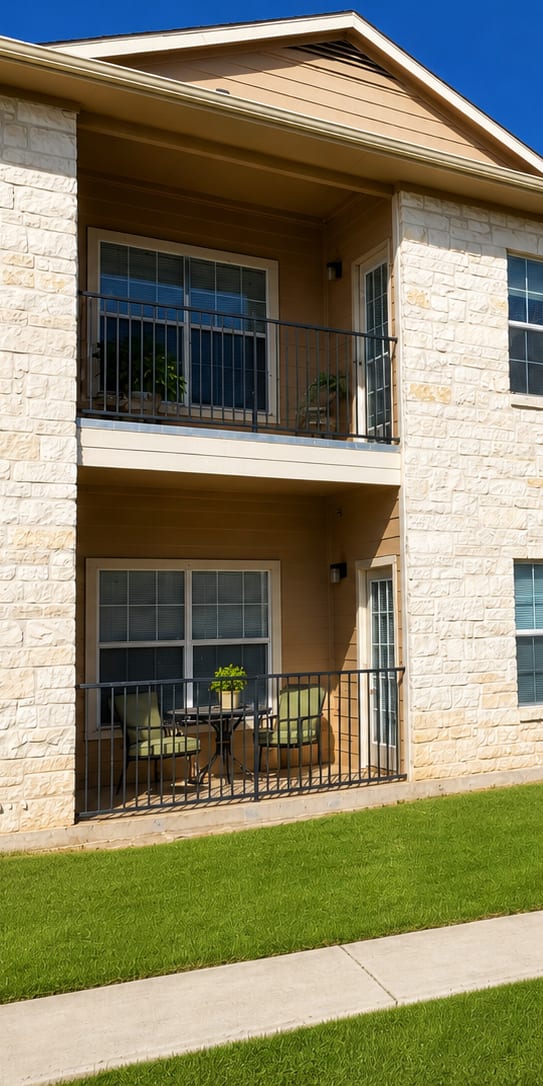 A large house with a stone pillar in front that says Pine Valley.