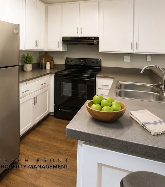 A well-lit, modern kitchen and living room with a dining area.