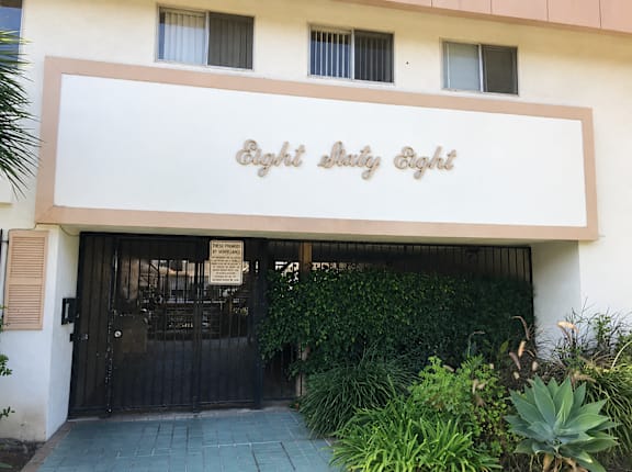 The front of a building with a sign that says "Eight Day Eight".