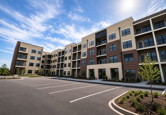 The Elwood exterior view with parking area - Kokomo, IN