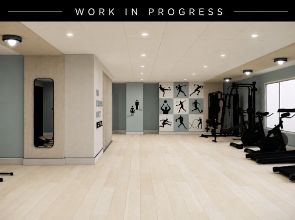A gym with a variety of equipment and a wall with exercise illustrations.