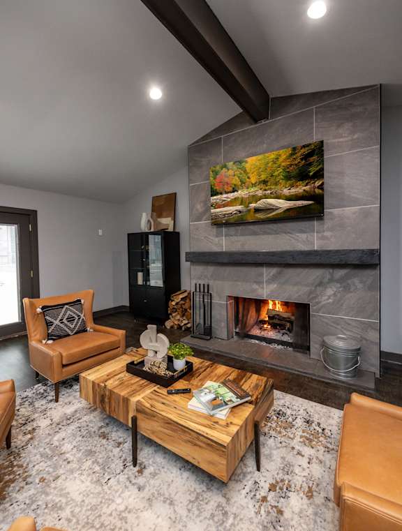 a living room with couches and a coffee table