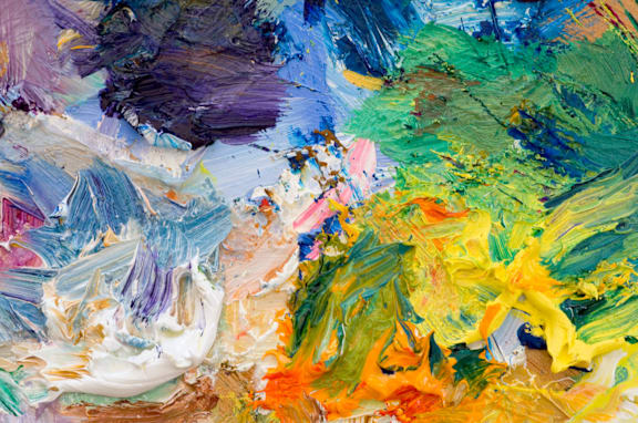 a close up of a painting with many different colors and brushstrokes
