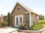 Thumbnail 11 of 11 - Exterior of leasing office at Waters Mark Apartment Homes, Gulfport