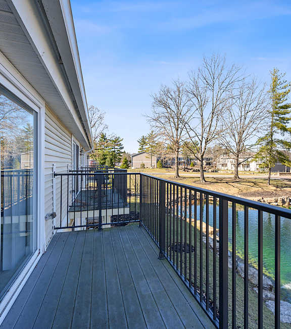 the view of the river from the balcony of a rental home