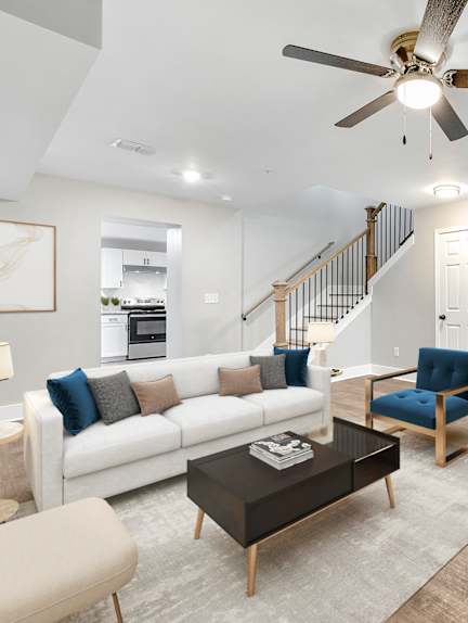 a living room with a couch and a table at Crogman School Lofts in Atlanta, Georgia 30315