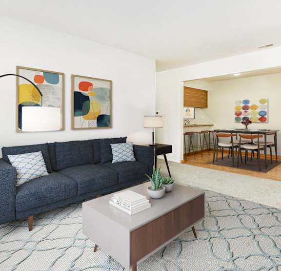 a living room and dining room at Tanglewood Apartments, Oak Creek