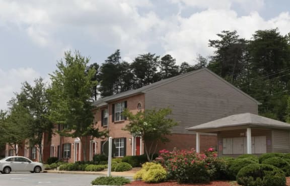 A house with a grey roof and a car parked in front  at Brookside Pointe, Travelers Rest, SC 29690