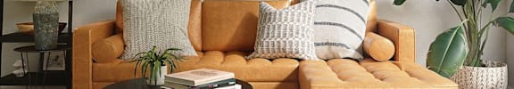 Model Living Room with Plants and Accent Pieces