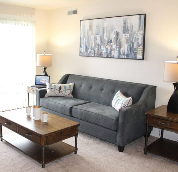 Living Room at Trappers Cove Apartments, Lansing, 48910