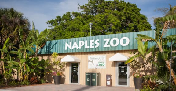 The Naples Zoo is surrounded by lush greenery. at The Teale Golden Gate in Naples, FL, 34116