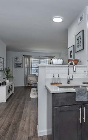 A kitchen with a stainless steel refrigerator, microwave, and oven. at Ten31, Dayton, 45458