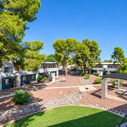 A sunny day at a residential area with a clear blue sky.