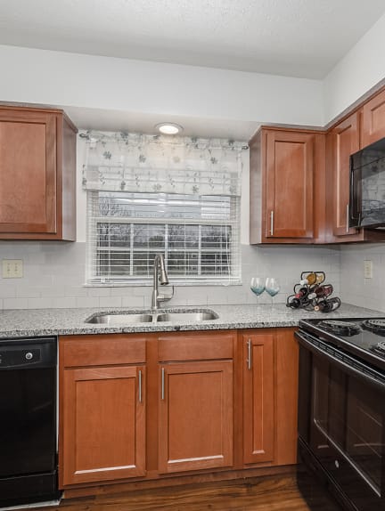 Kitchen with cabinets at Normandy Club, Centerville