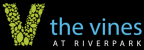 a logo for the vines at river park at night