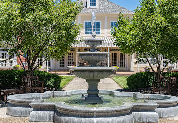 a fountain in a courtyard in front of a house at Bishops Gate, Cincinnati, OH, 45249