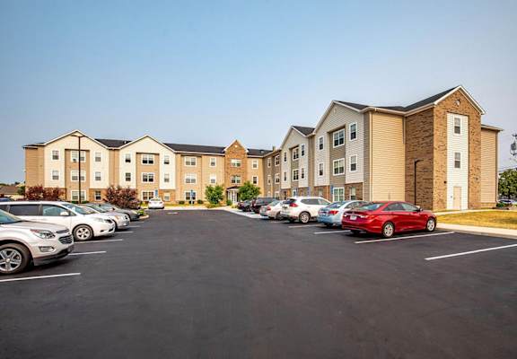 a parking lot in front of a building