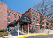 Thumbnail 1 of 15 - Harbor Hill Apartments exterior