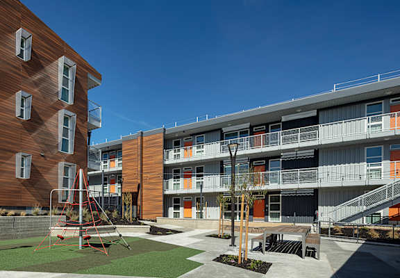 a view of the courtyard and balconies of an apartment complex at ROCKY HILL VETERANS HOUSING, VACAVILLE, CA