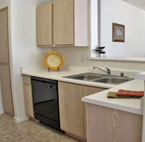Kitchen with modern equipment at The Groves, Mesa, Arizona