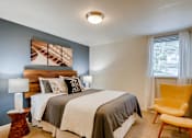 Thumbnail 13 of 34 - Three Bedroom Apartments in Happy Valley, OR - Sunnyside Village Apartments Large Bedroom with Carpet Flooring and Window