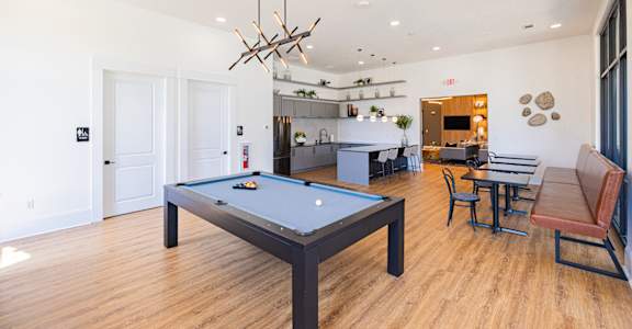 the reserve at bucklin hill leasing office game room with pool table and ping pong table
