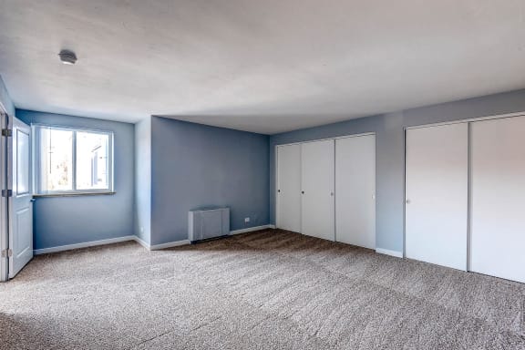 Bedroom with Large Closets at Peak 54