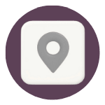 A map pin icon inside a green circle.