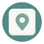 A map pin icon inside a green circle.