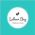 A circular logo with the text "Labour Day" and a graphic of a heart above the text.