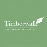 a green logo with a white arrow on it