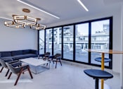 Thumbnail 5 of 37 - Residents Lounge with Seating Areas