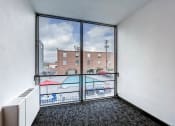 Thumbnail 6 of 17 - Hallway with View of Pool at Peak 54